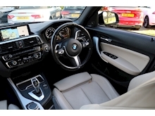 BMW 1 Series M140i Shadow Edition (Adap Suspension+SUNROOF+ELECTRIC Seats+Harmon Karden+Big Screen PRO MEDIA) - Thumb 27