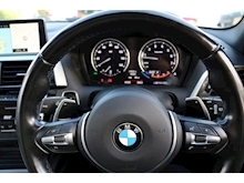 BMW 1 Series M140i Shadow Edition (Adap Suspension+SUNROOF+ELECTRIC Seats+Harmon Karden+Big Screen PRO MEDIA) - Thumb 30