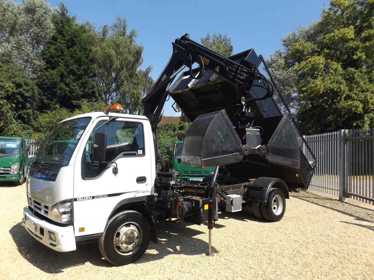 Nqr Tipper with Crane and Bucket Grab - 7.5T Manual Diesel