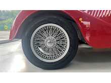MORGAN PLUS FOUR FINISHED IN METALLIC RED