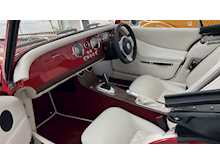 MORGAN PLUS FOUR FINISHED IN METALLIC RED