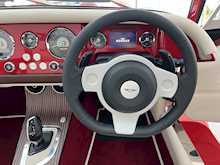 MORGAN PLUS FOUR FINISHED IN METALLIC RED