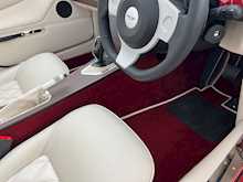 MORGAN PLUS FOUR FINISHED IN METALLIC RED