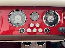 MORGAN PLUS FOUR FINISHED IN METALLIC RED