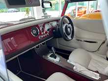 MORGAN PLUS FOUR FINISHED IN METALLIC RED