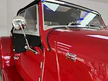 MORGAN PLUS FOUR FINISHED IN METALLIC RED