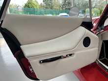 MORGAN PLUS FOUR FINISHED IN METALLIC RED